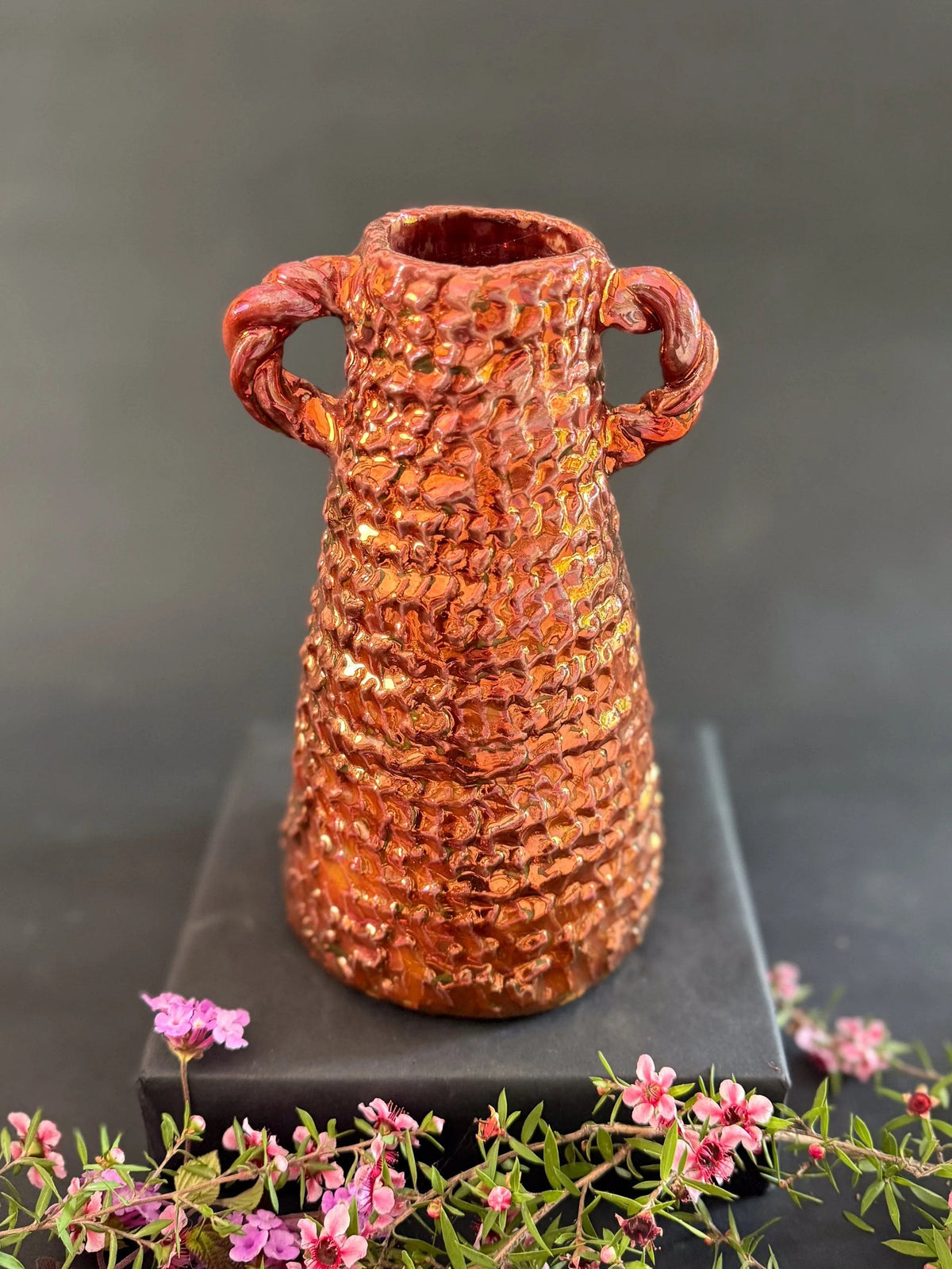 Rustic Ceramic Vase with Woven Texture and Twisted Handles