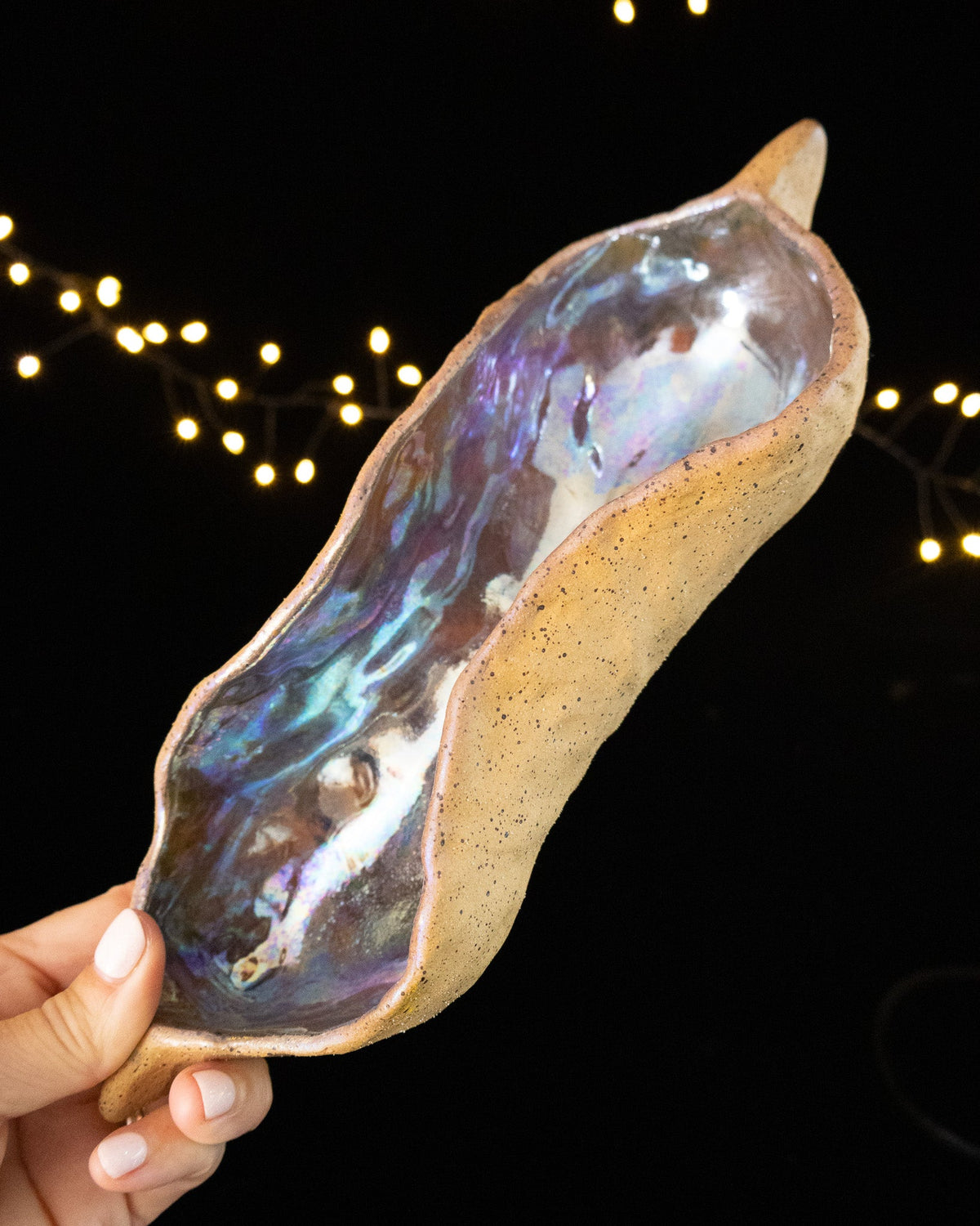 Rustic Ceramic Trinket Dish with Curved Pod Shape and Silver-Blue Glaze