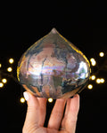 Organic Ceramic Decorative Sculpture with Silver-Toned Droplet Shape