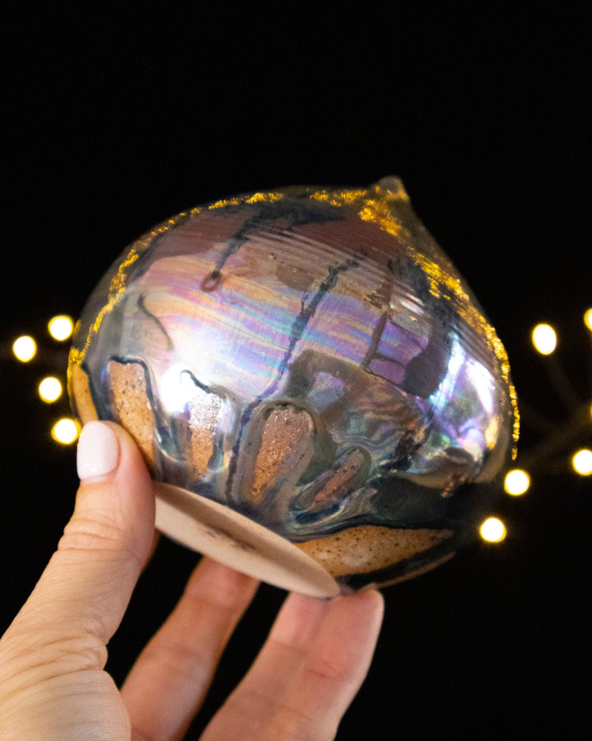 Organic Ceramic Decorative Sculpture with Silver-Toned Droplet Shape