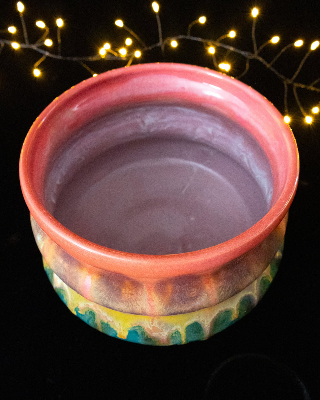 Colorful Ceramic Plant Pot with Turquoise Glaze and Curved Sides