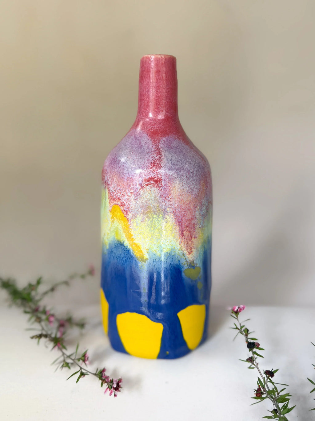 Colorful Ceramic Bottle Vase with Pink Neck and Blue-Yellow Pattern