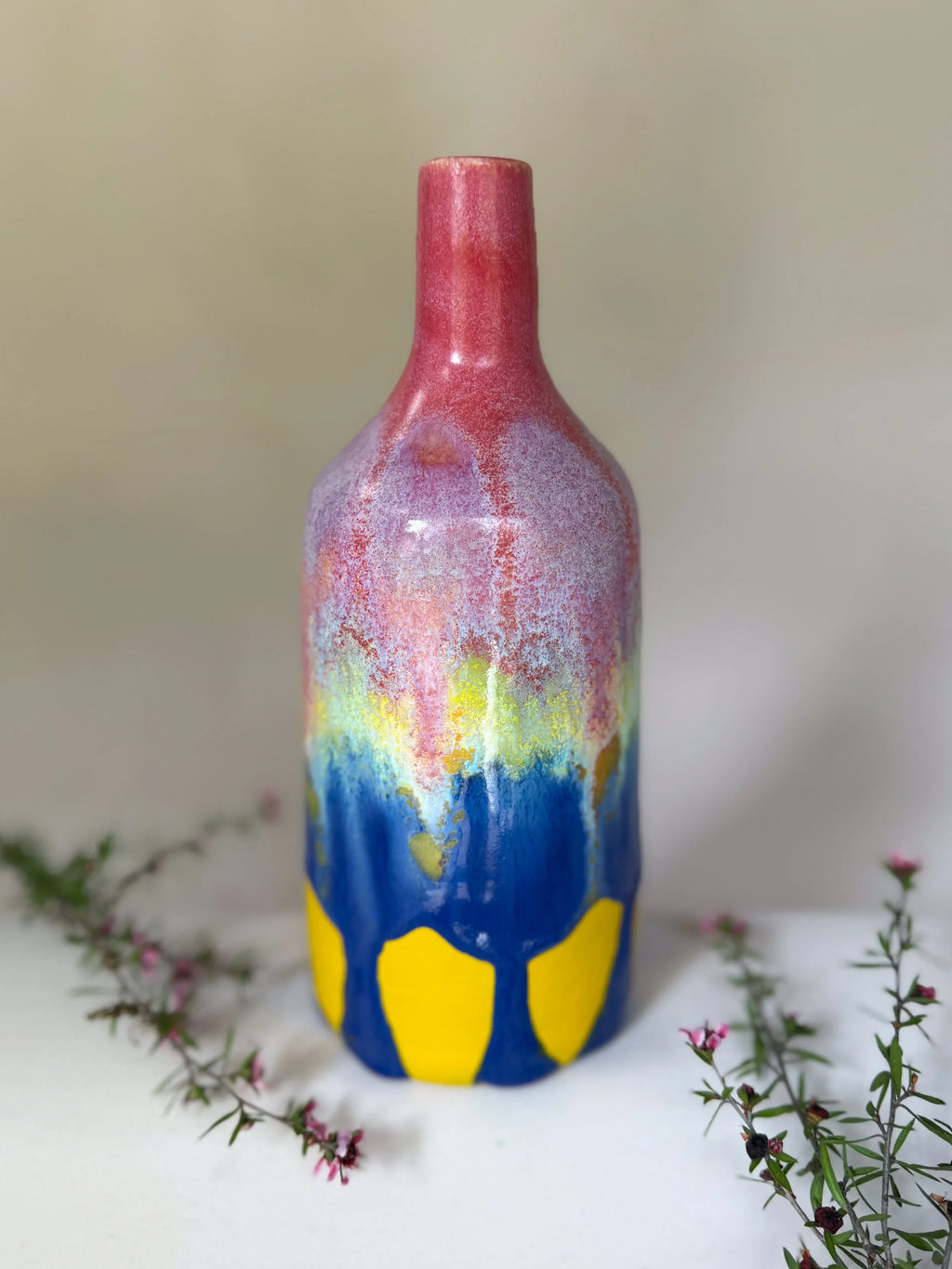 Colorful Ceramic Bottle Vase with Pink Neck and Blue-Yellow Pattern