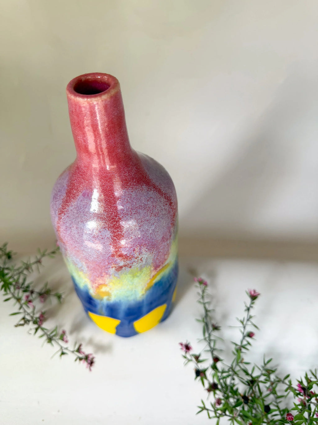 Colorful Ceramic Bottle Vase with Pink Neck and Blue-Yellow Pattern